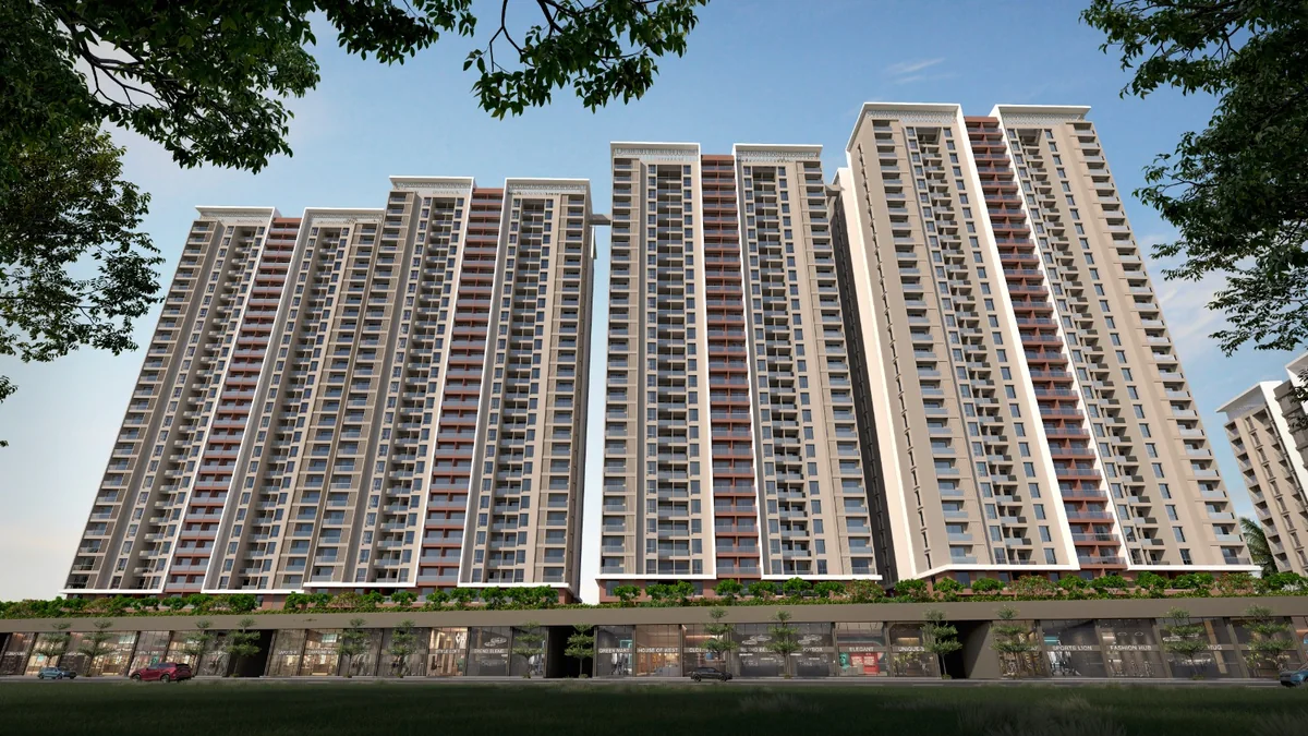 Four 27-storey towers of Mangalam Starview Kiwale at dusk